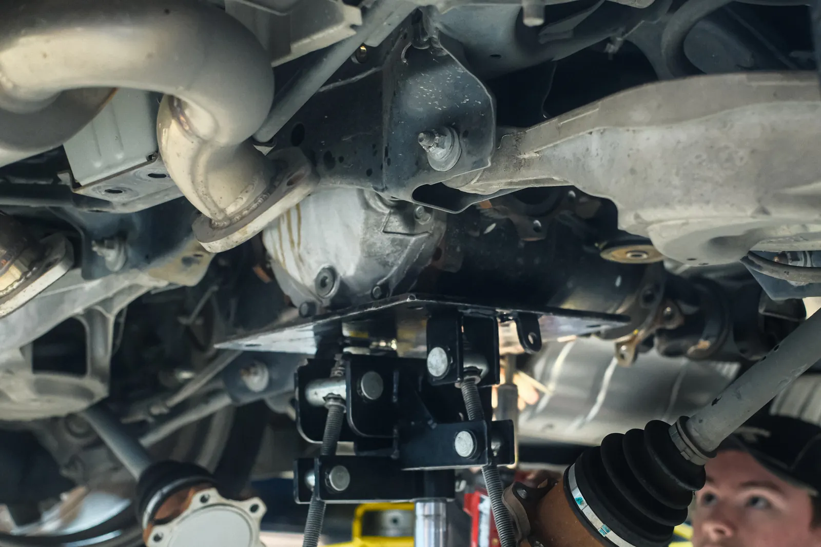 370Z rear diff lowered on a transmission jack for bush replacement