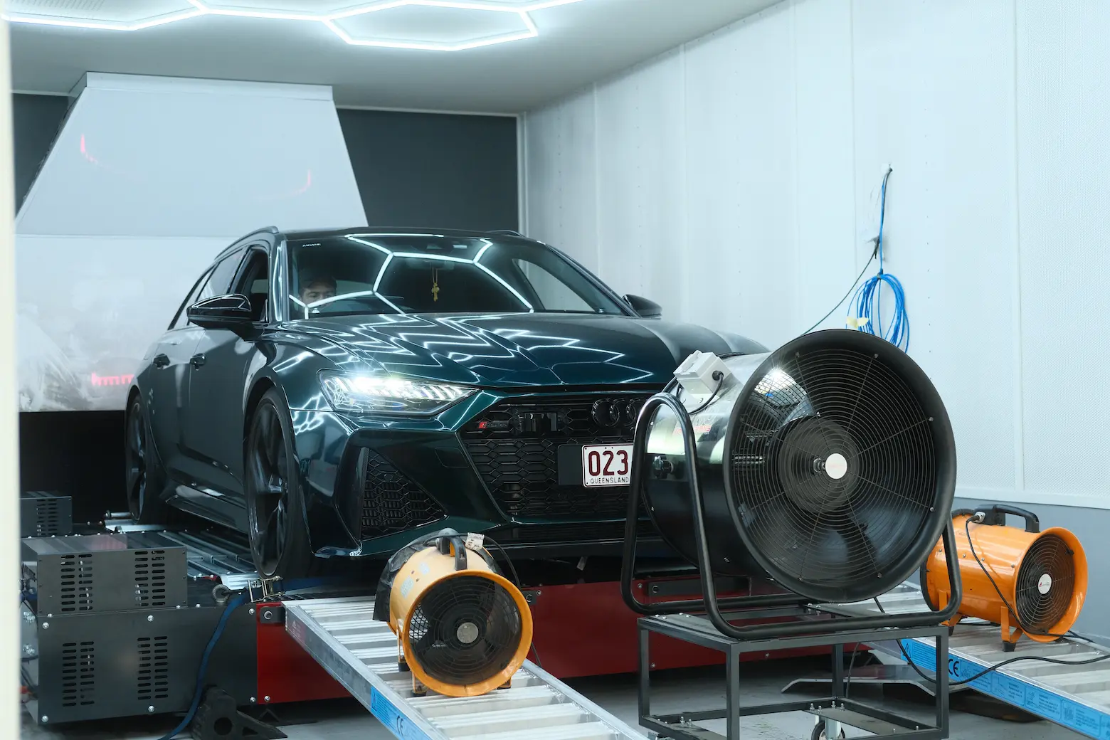 Engine bay detail during a turbo installation at Revzone