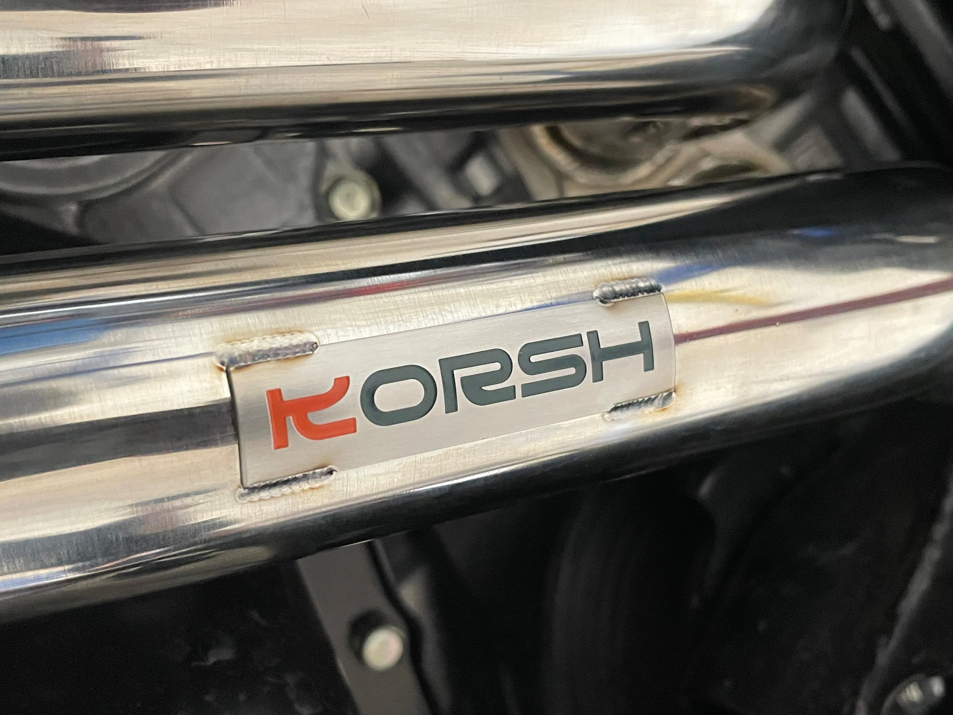 Korsh badge on UEL header pipe