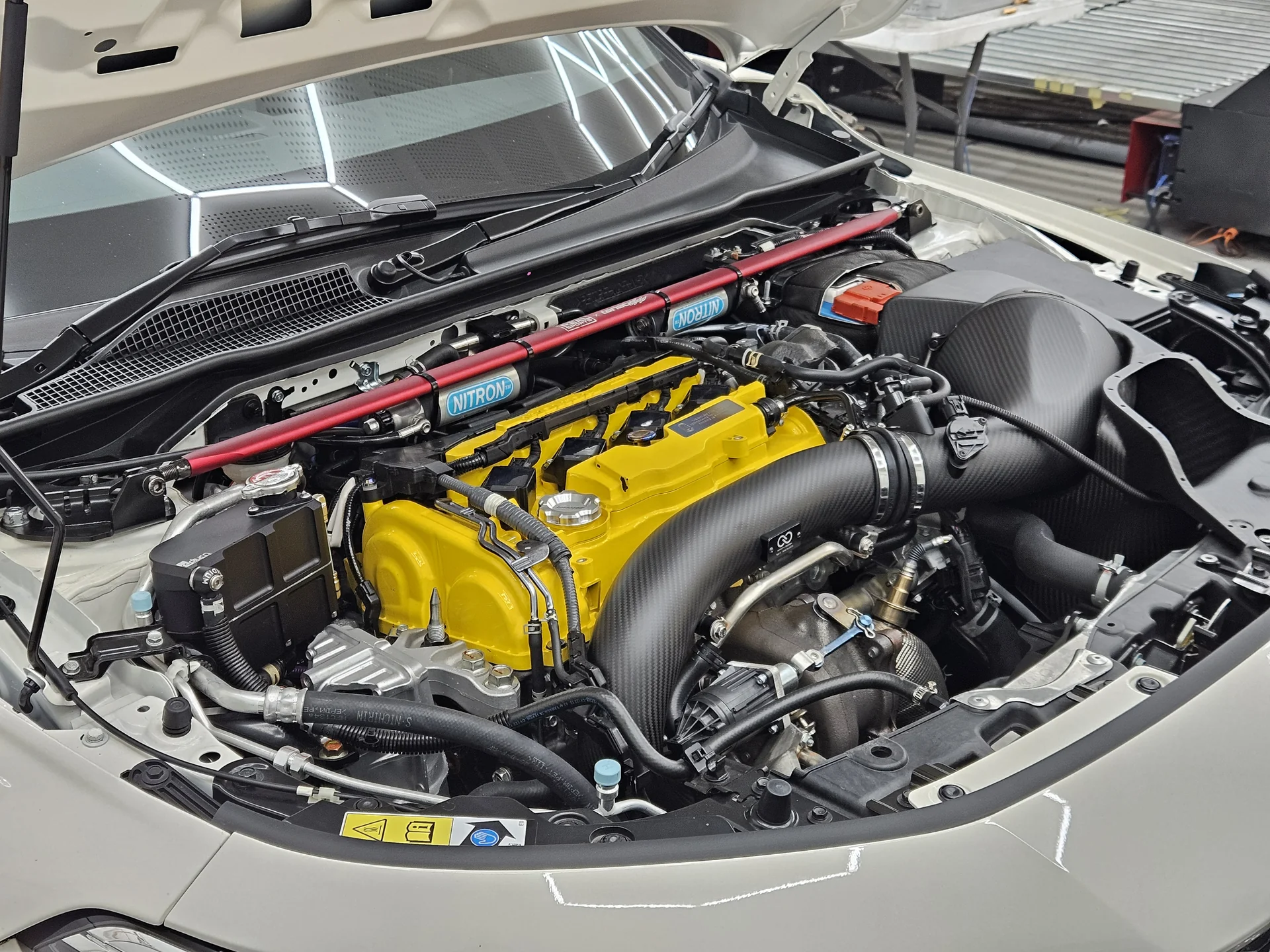 Carbon turbo inlet tube and yellow valve cover on the FL5's K20C1