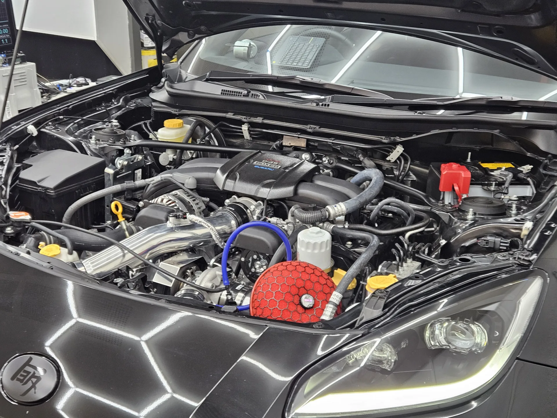 HKS GTIII-RS turbo kit installed in Toyota GR86 ZN8 engine bay with HKS intake filter