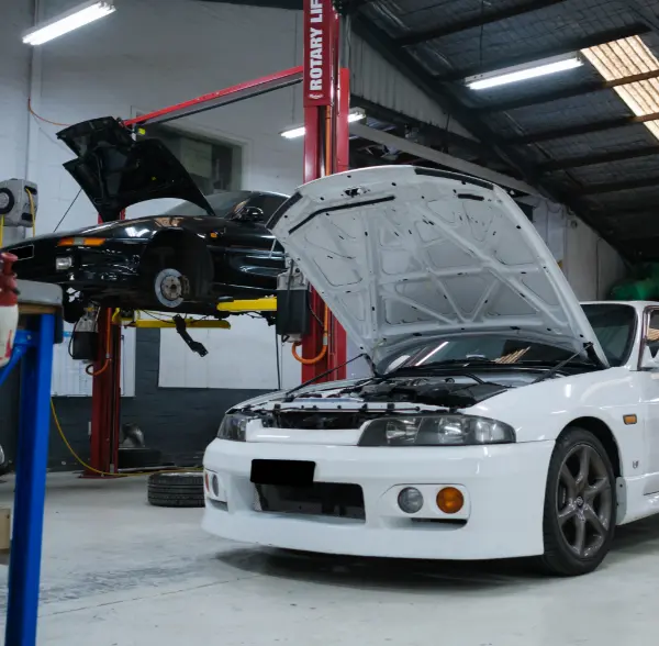 Logbook servicing and mechanical repairs in the Revzone workshop