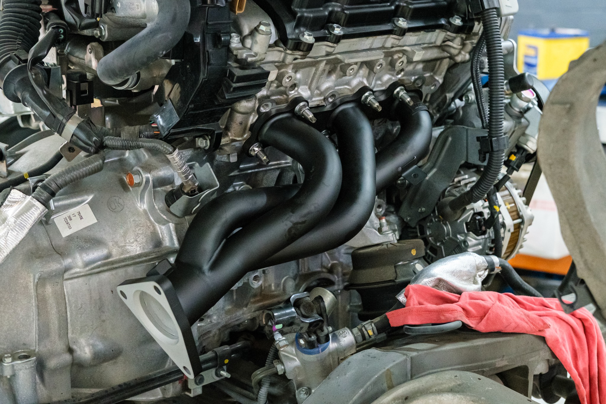 Fujitsubo ceramic coated headers installed on VQ37 engine