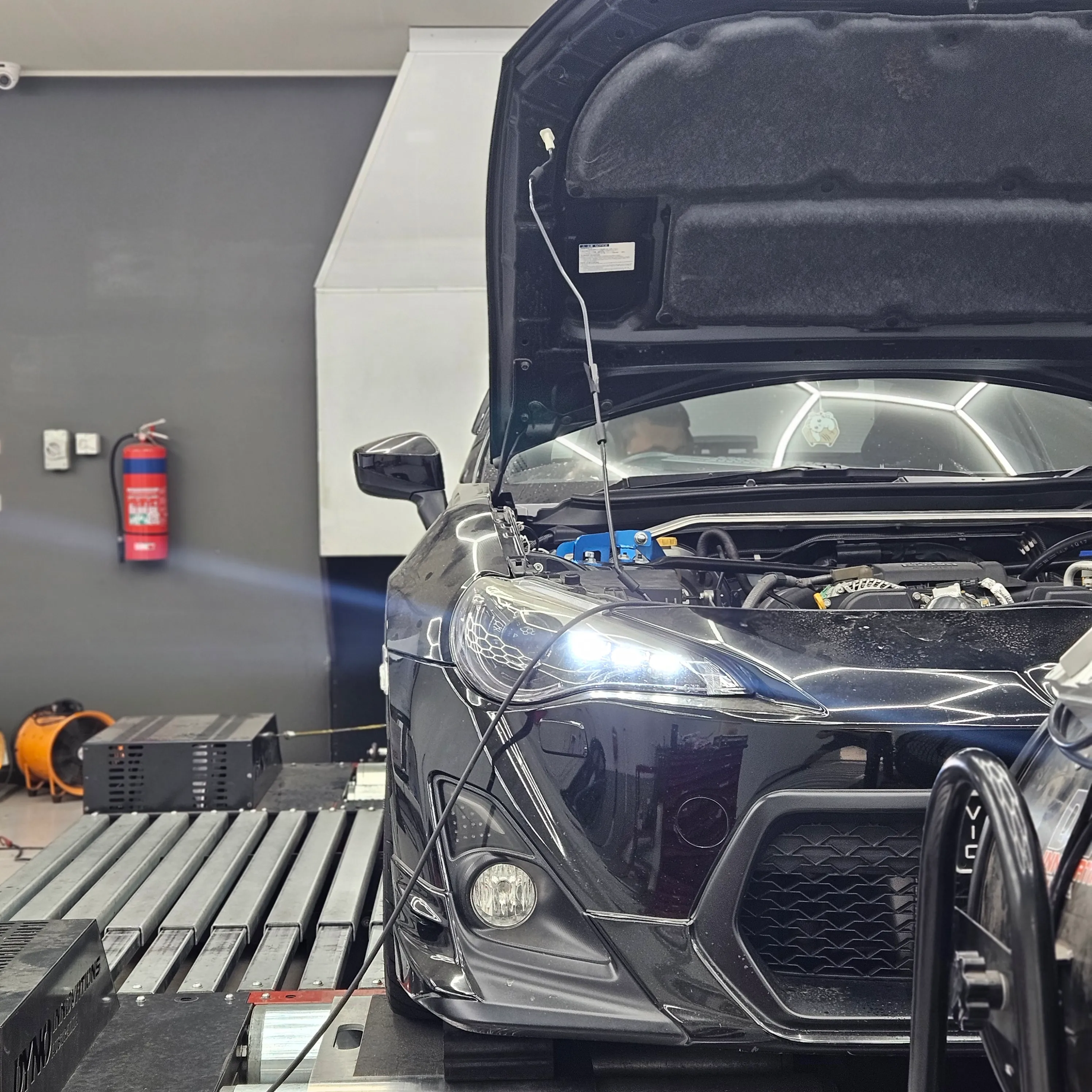 Black Toyota 86 on the roller dyno at Revzone Melbourne