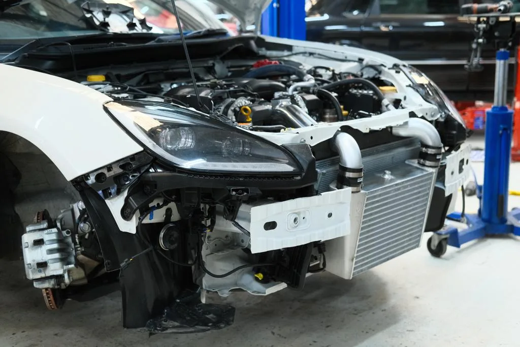 Subaru BRZ ZD8 front end stripped down during HKS turbo kit intercooler installation at Revzone Melbourne