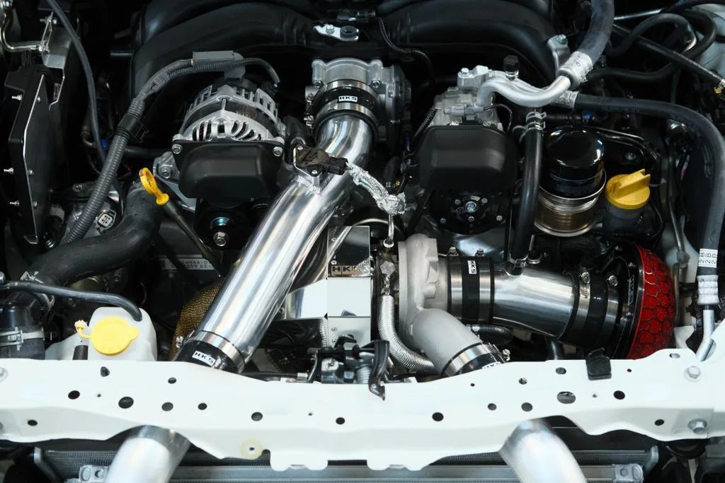 HKS turbo and polished charge piping detail in Subaru BRZ ZD8 engine bay