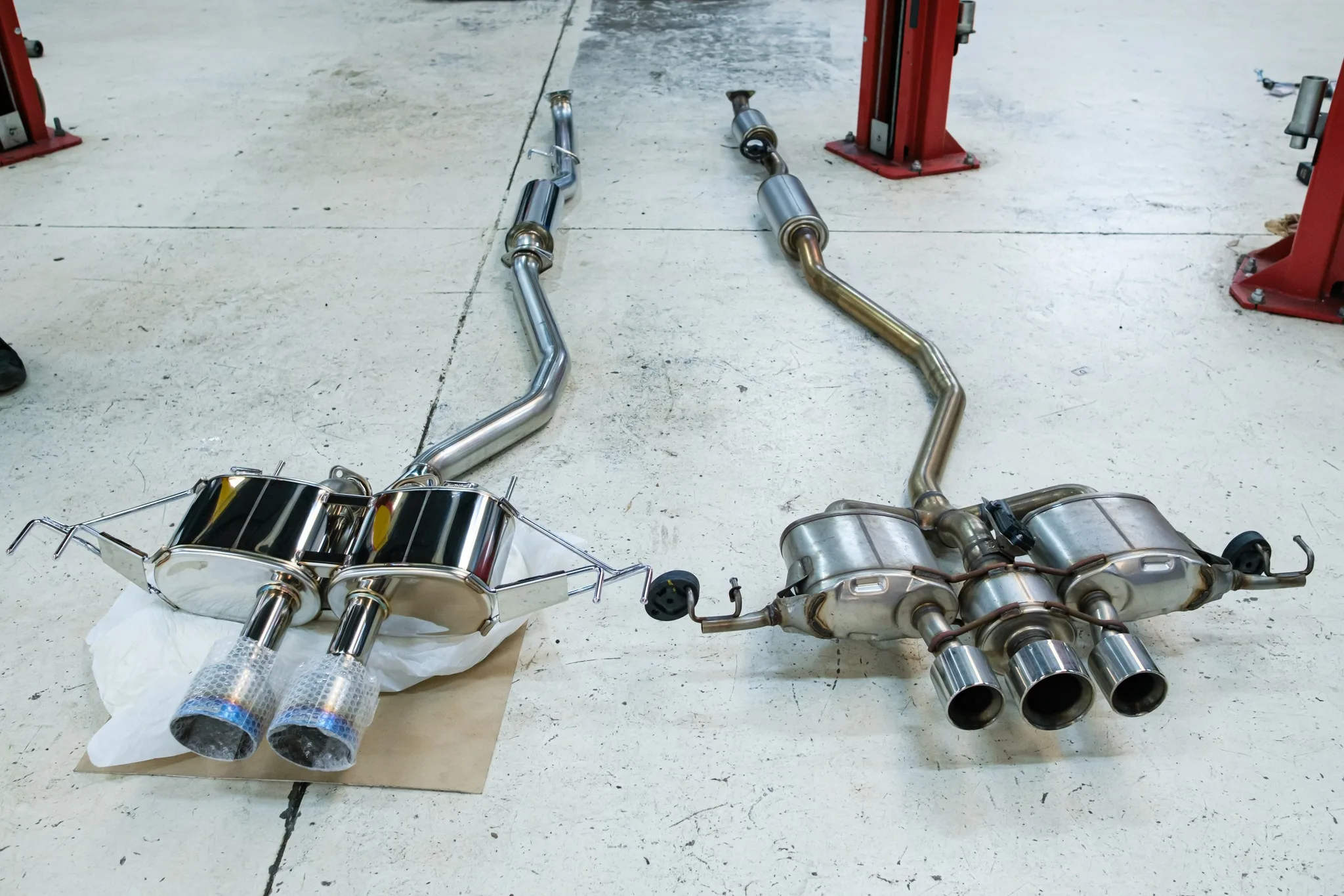 HKS Legamax Sports catback exhaust next to stock Honda Civic Type R FL5 exhaust side-by-side comparison
