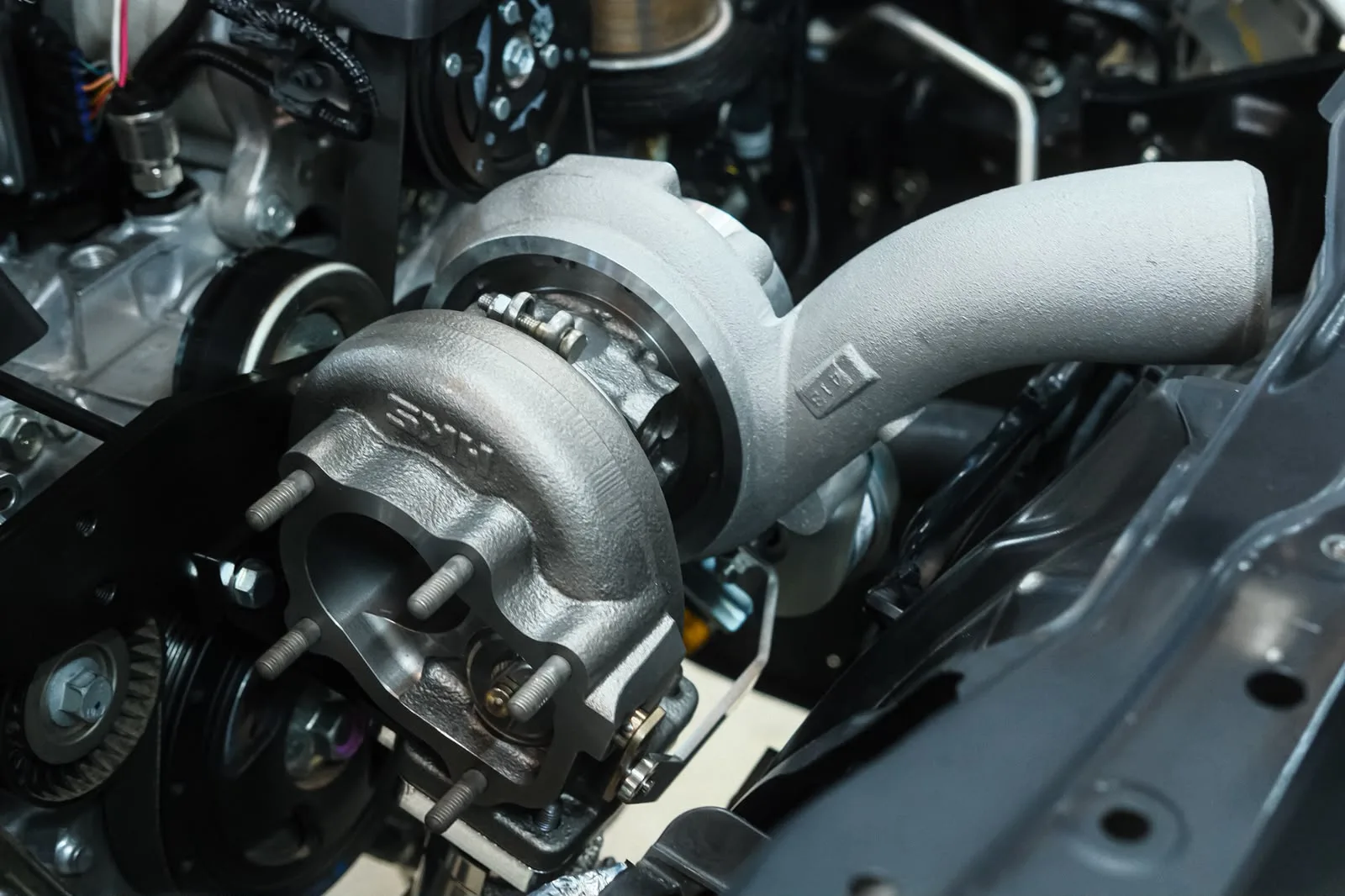 HKS GTIII-RS turbo and cast suction pipe mounted on the FA24 engine