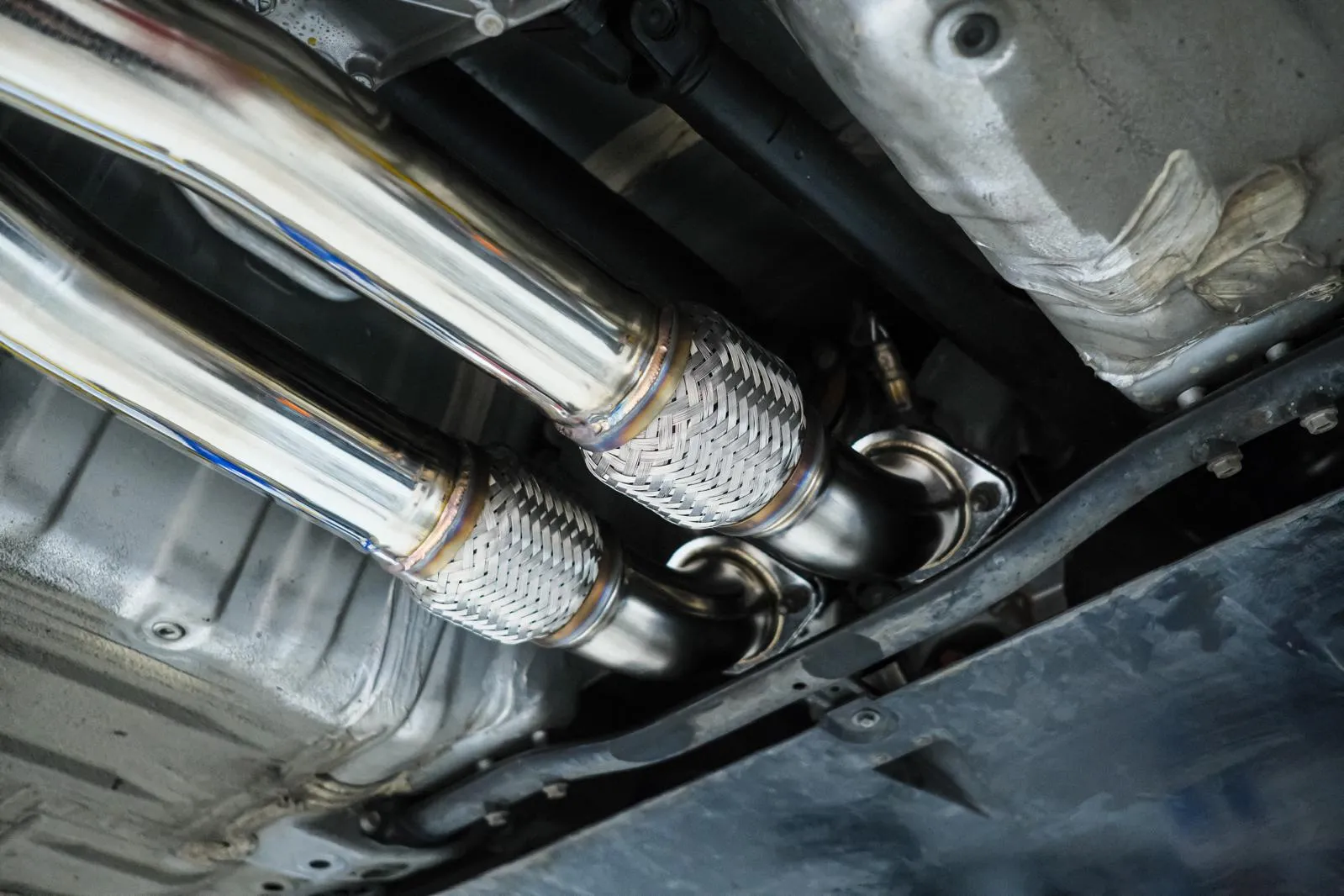 HKS Legamax Premium stainless flex joint with heat-blue weld colour