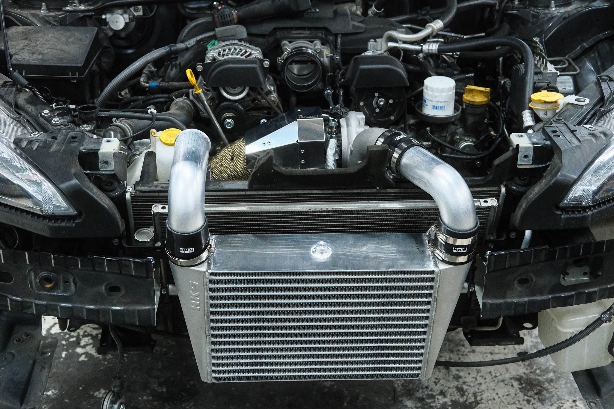 HKS intercooler and charge piping aligned and fitted