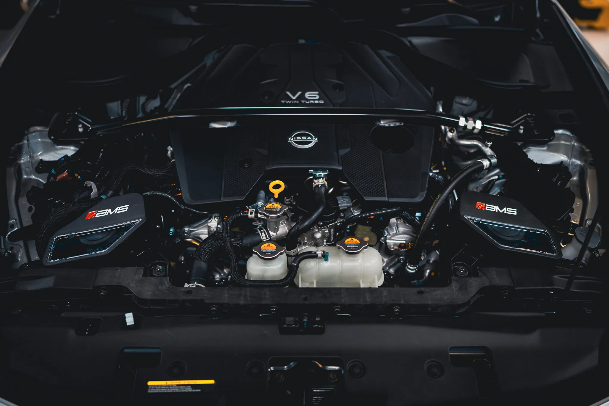 AMS Performance cold air intakes installed in Nissan Z VR30 engine bay